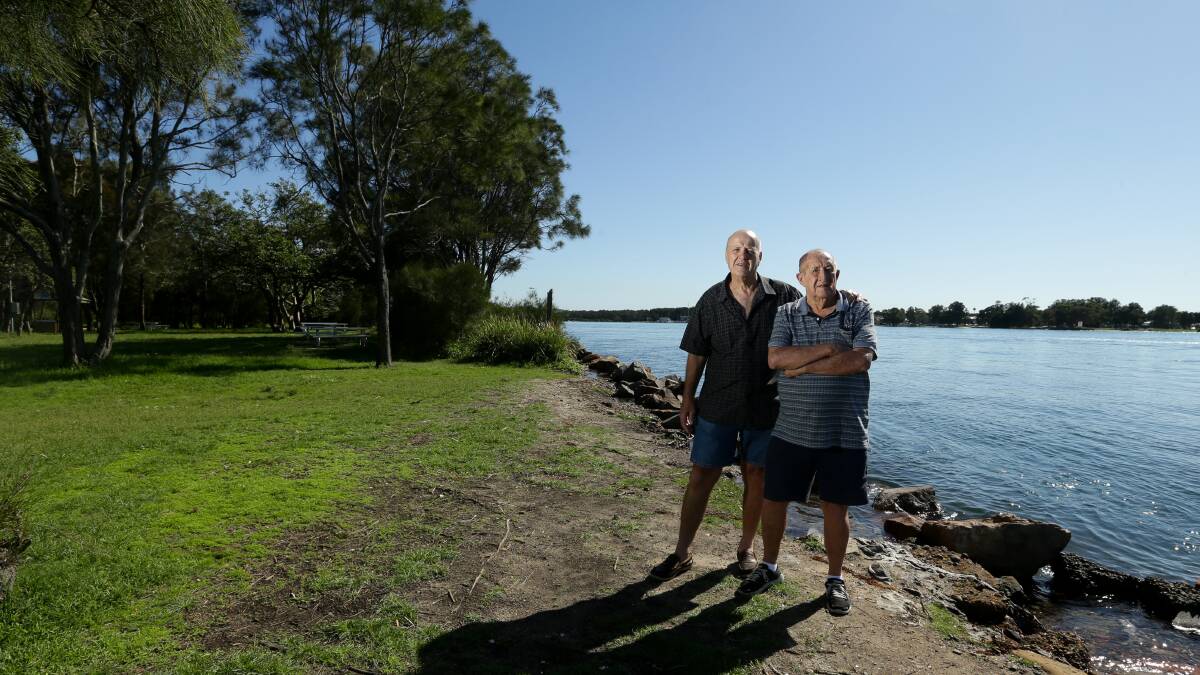 FAMILY: Herbert Heaney's grandchildren Greg and Warren Heaney, pictured on Coon Island, said if the island name is changed they want it to recognise the residents who lived there. Picture: Jonathan Carroll