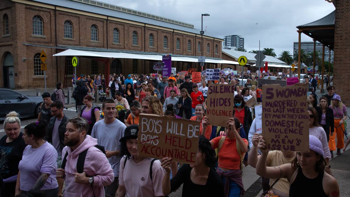 ACTION: Women marching in Newcastle earlier this week in a call to end domestic violence. Picture: Marina Neil