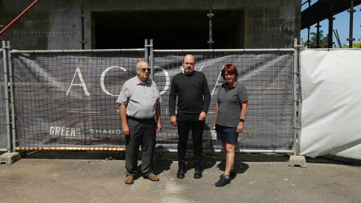 DISMAYED: Kevin Moon, Michael Barwell and Lesley Afflick in front of the site where the developer is seeking to remove a right-of-way easement. Picture: Jonathan Carroll