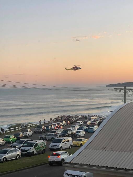 The Westpac Helicopter over Bar Beach on Friday afternoon. Picture: Lacie Hodges