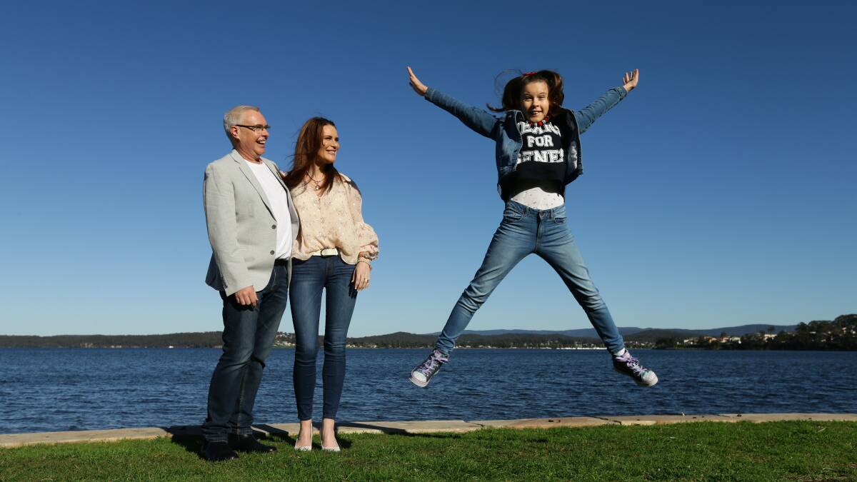 CAUSE: Mollyjane Boyson, pictured with parents Joe and Jessica Rothwell, is urging people to support Jeans for Genes Day, which is this Friday. Picture: Jonathan Carroll