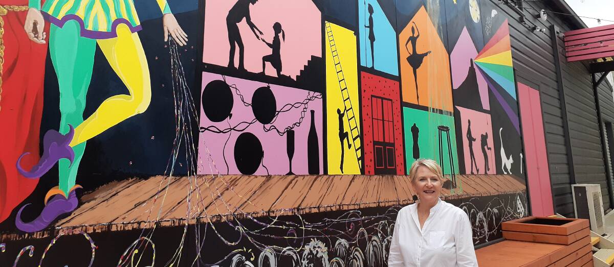 BRIGHT: NTC president Claire Williams in front of the new mural.