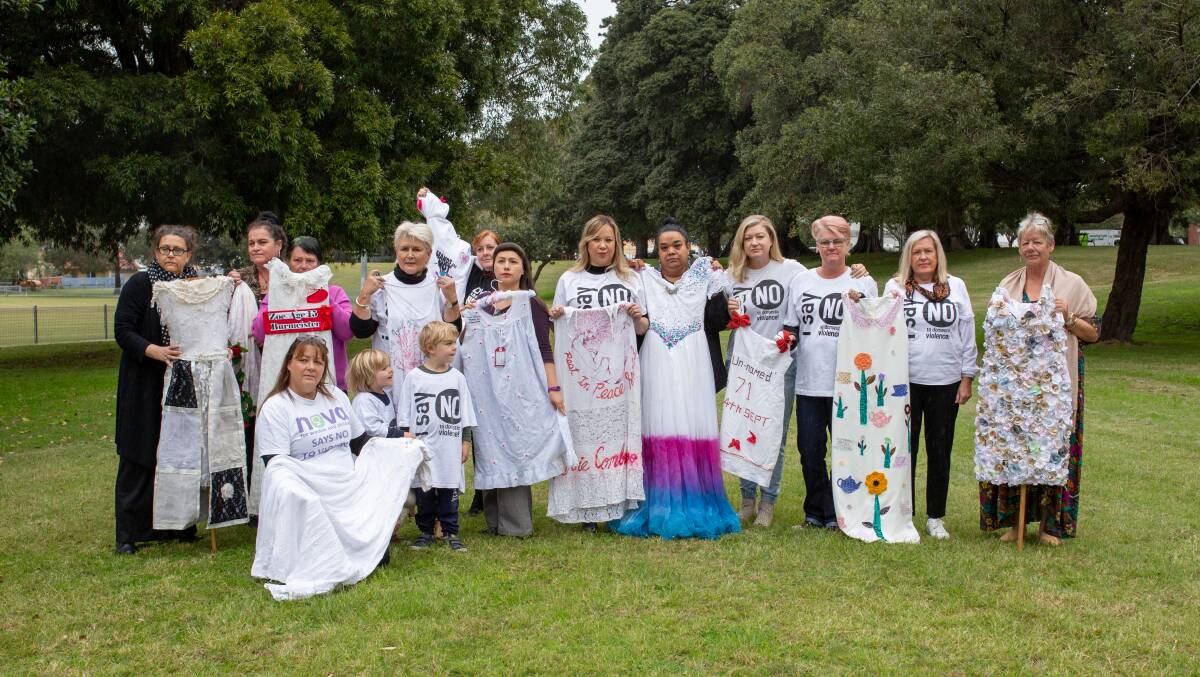ACTION: Some of the Newcastle contingent heading to Canberra to display the white dresses at Parliament House. Picture: supplied