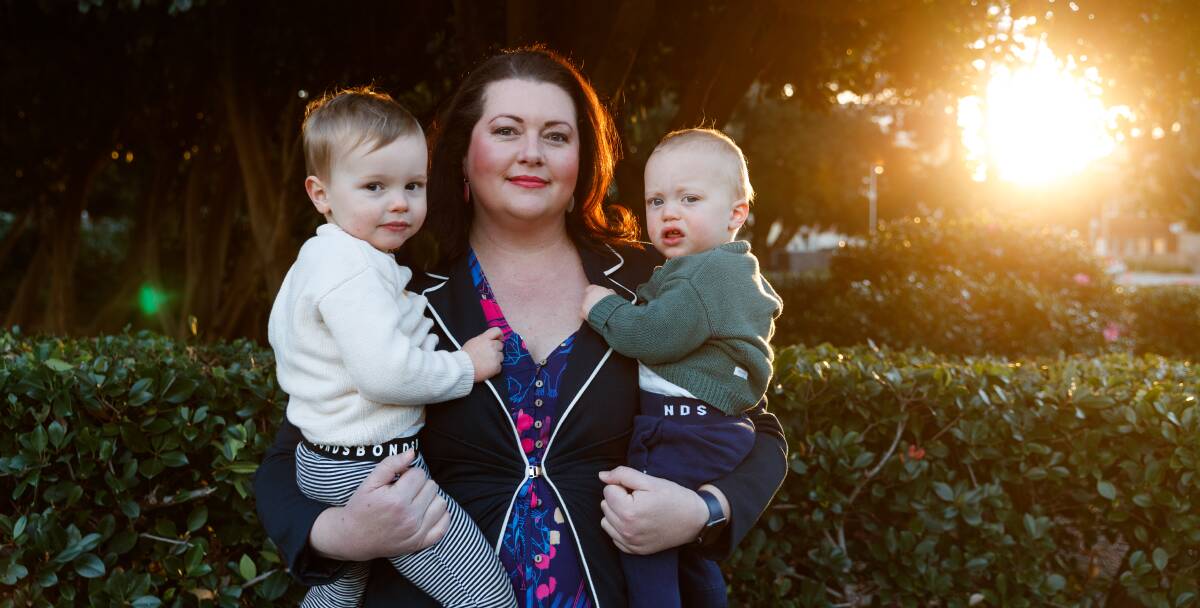 JUGGLE: Port Stephens councillor Jaimie Abbott, pictured with her sons Harvey, 2, and Harrison, 1, says she felt the need to call out the social media criticism for missing meetings and having children. Picture: Max Mason-Hubers