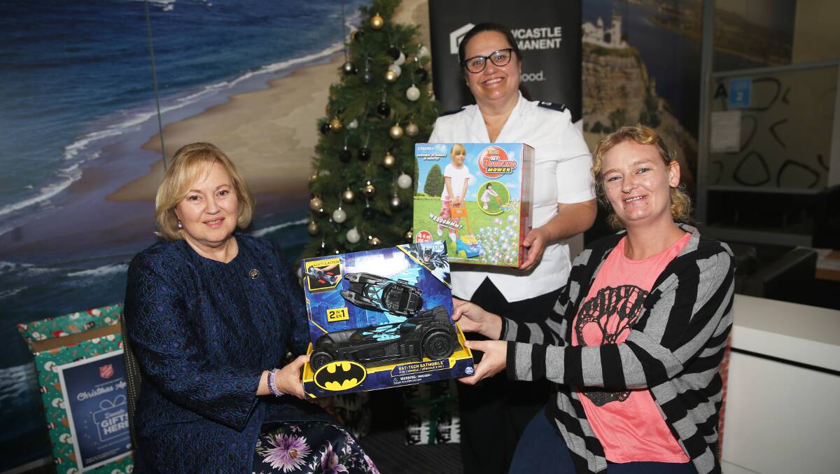 GIFT: Newcastle Permanent CEO Bernadette Inglis, Salvation Army officer Tracey Iles and recipient Sara Goodridge. Picture: Peter Lorimer