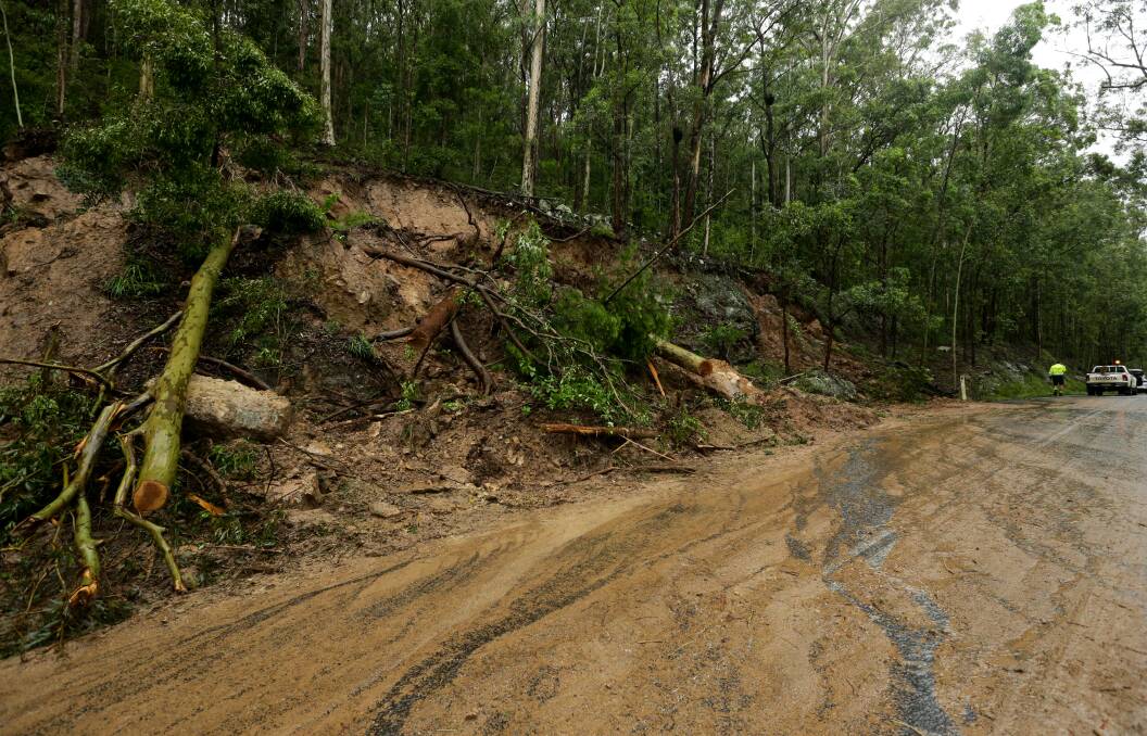 DANGER: The Bucketts Way was temporarily shut after a landslide caused by heavy rain in March. 