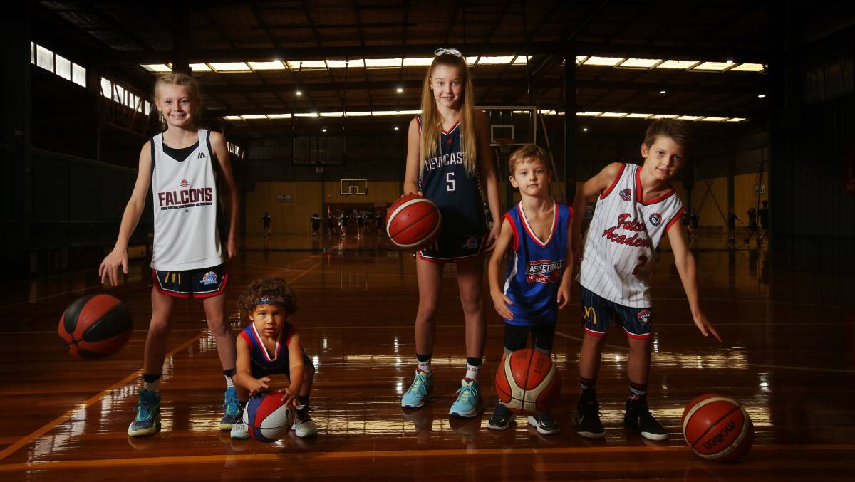 Young basketball players Evie Macdougall, Taiyo Brown, Laila Macdougall, Nate Macdougall and Wil Macdougall at the announcement of the development of the new Newcastle Basketball Stadium. Picture by Simone De Peak 