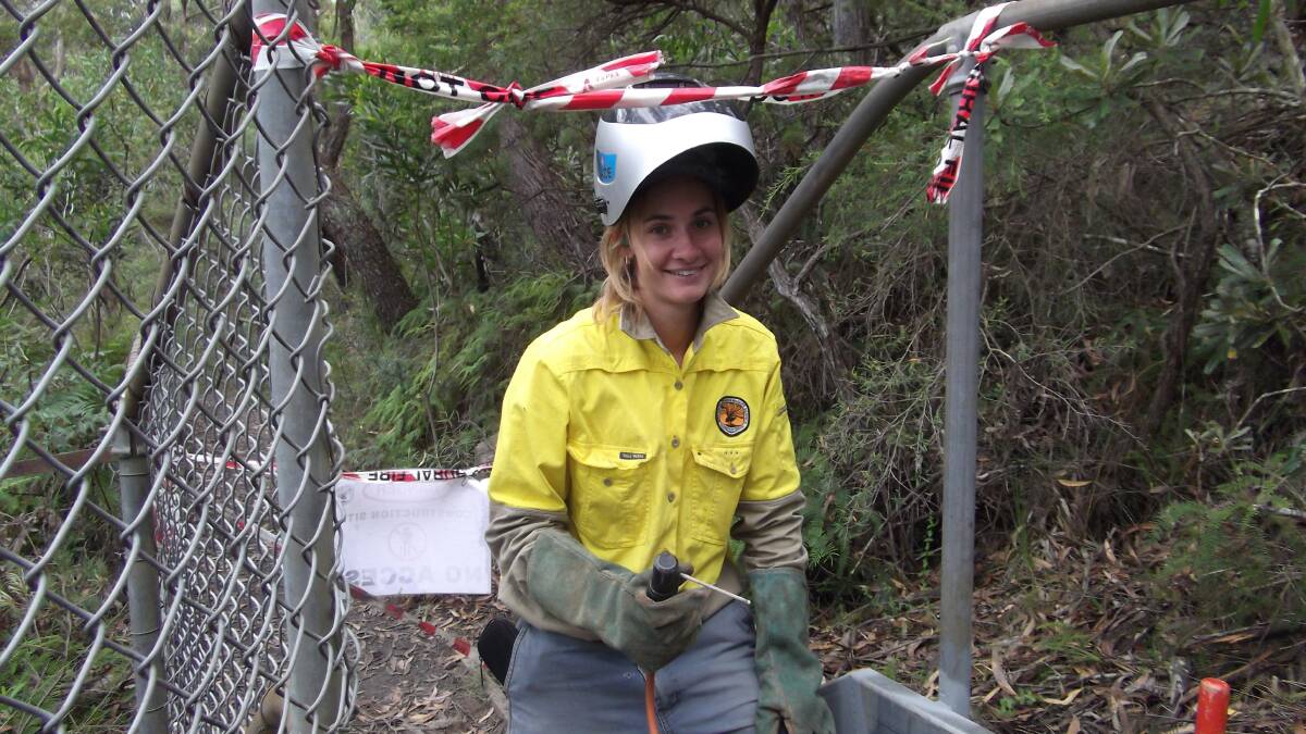 OPPORTUNITY: Gloucester's Emily Smith has helped build walking tracks in the Snowy Mountains and travelled to Canada to help fight wildfires in her role with the National Parks and Wildlife Service.