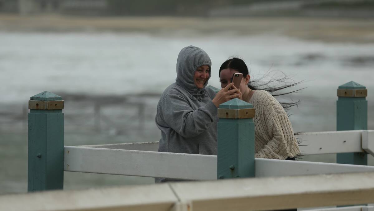 COLD: It was wild and windy in Newcastle on Monday. Picture: Jonathan Carroll