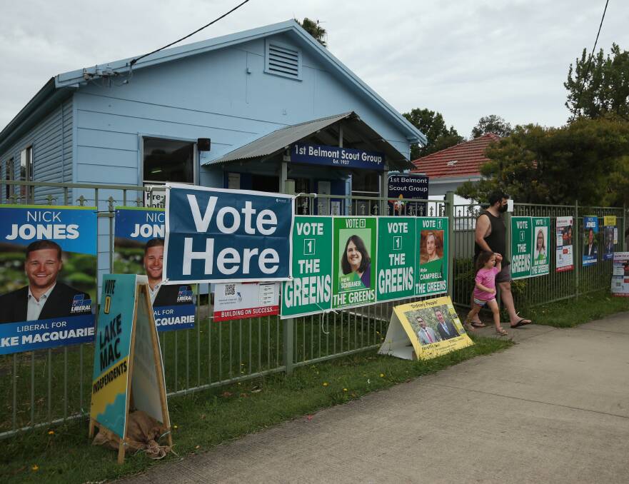 VOTE HERE: Posters at Belmont pre-poll. Picture: Simone De Peak