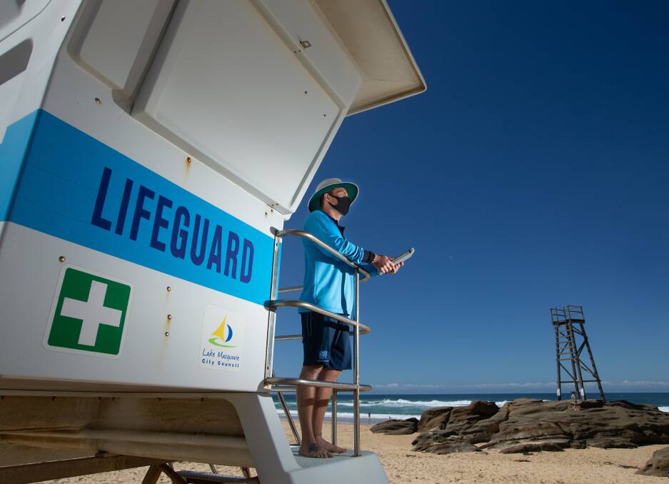 SAFETY: Lake Macquarie team leader beach lifeguards Lucas Samways using the new technology at Redhead beach on Friday. Picture: Marina Neil