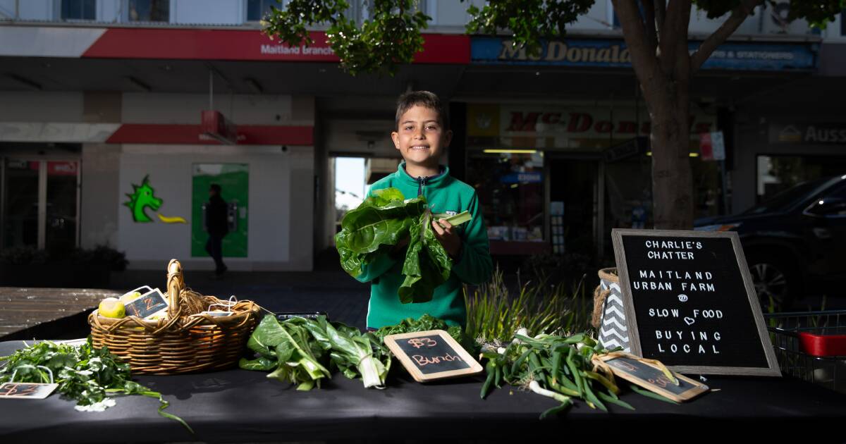 10-year-old Charlie growing into his produce market role