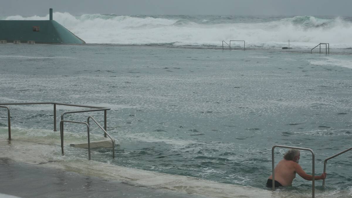 POOL: A very rainy Newcastle Ocean Baths on Thursday. Works are set to kick off on March 14. Picture: Simone De Peak