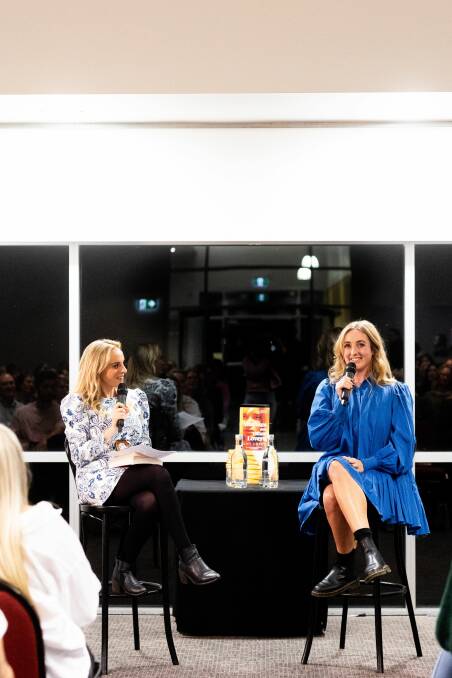 Amy Lovat (right) at her book launch with Clare Stephens at Fort Scratchley on July 14. Picture by Caitlin Amy Photography