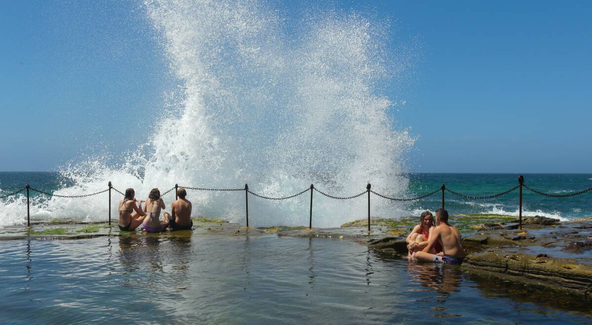 SPLASH HIT: Swimmers take advantage of the reopening of the Bogey Hole on Wednesday. Picture: Jonathan Carroll