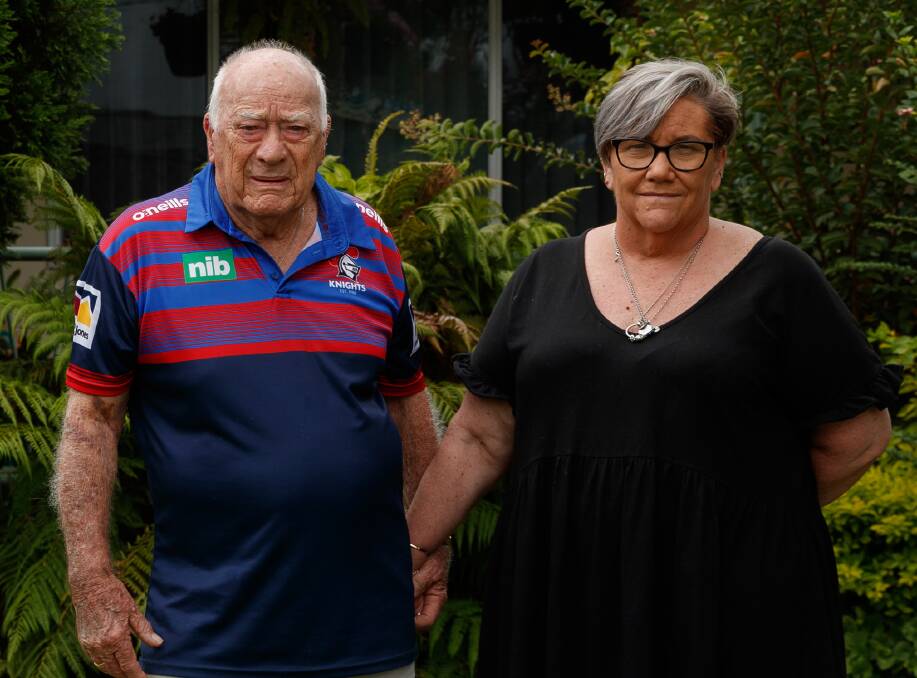 HEARTBROKEN: John Essex and his daughter Lynne at home this week after Gaye's death. Picture: Max Mason-Hubers