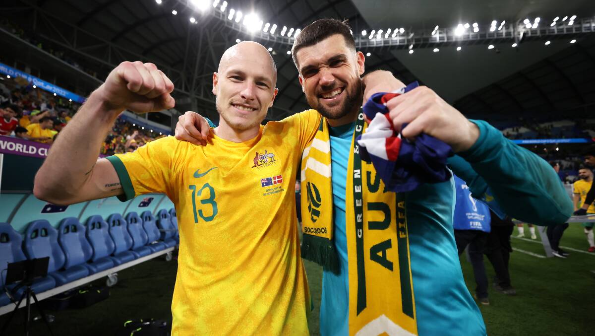 Aaron Mooy and Mat Ryan after the win over Denmark. Picture by Getty