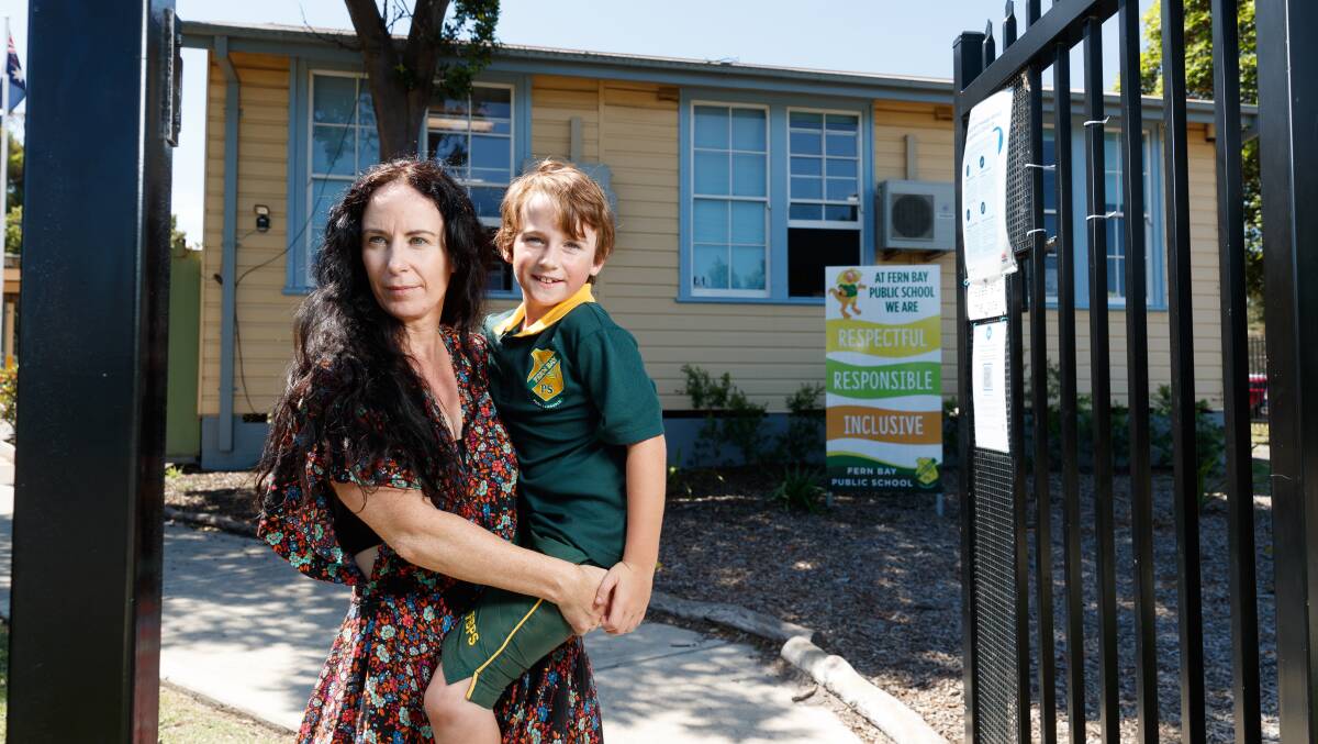 Concerned: Belinda Schasser, with son Mason. She said Fern Bay Public School's facilities didn't reflect its great students, staff and community feel. "We've got fabulous teachers who do an amazing job with our kids and I can't fault them at all, but you don't know that when you're walking into the school," she said. Picture: Max Mason-Hubers