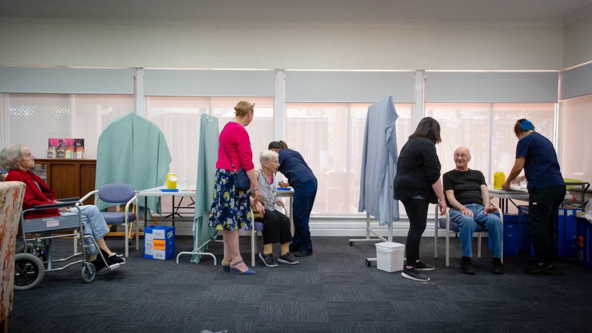 ROLLING OUT: Residents and staff at the St Andrews aged care village in Canberra get the vaccination on Friday. Picture: Elesa Kurtz