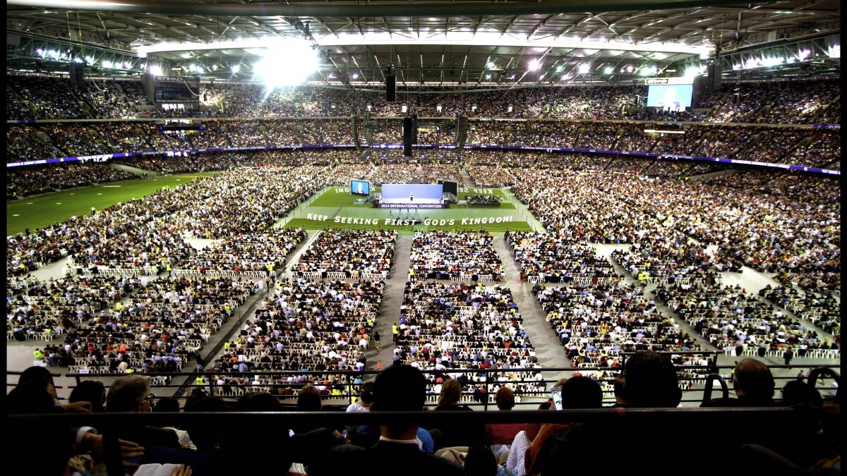 FOLLOWERS: A packed Docklands stadium in Melbourne for a Jehovah's Witnesses conference in 2014.