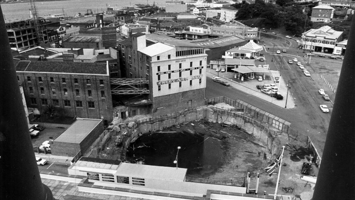 DIGGING IN: The start of Newcastle council’s ‘‘new’’ roundhouse in 1972. Just beyond the site, a petrol station and a KFC store are visible on the future tax office site.