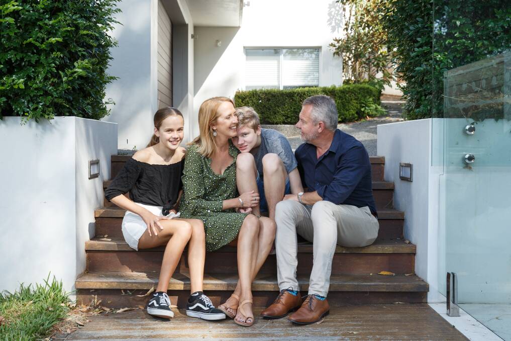 Family ties: "I think everyone with a child at Aspect is having that feeling of 'this is life-changing'," says Brett Lavaring, with wife Natasha Beyersdorf and children Cam, 15, and Tilly, 12. Picture: Max Mason-Hubers
