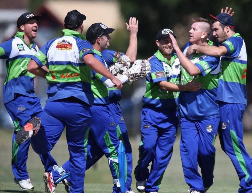 BOWLED: Hamilton Wickham's former Cricketers Arms A-grade Newcastle City and Suburban Cricket Association team celebrate a wicket. Picture: Grant Sproule