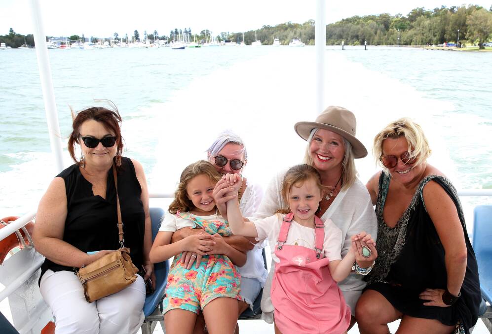 Enjoying the ferry ride from Belmont to Speers point, from left Julie Vallender, Gai Lovegrove, Ivy Gillies, Indigo Gillies, Erin Gillies and Melinda Lambert. Picture: Peter Lorimer