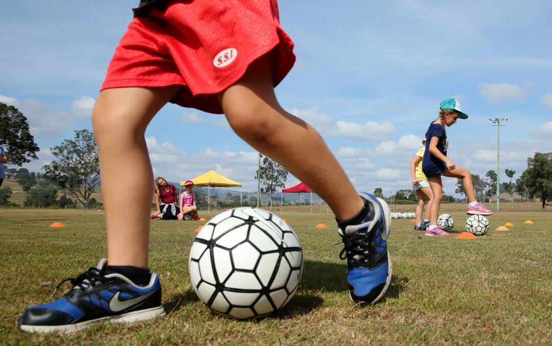 ON THE BALL: While you encourage your children to “play”, make sure you recommend sampling multiple sports.