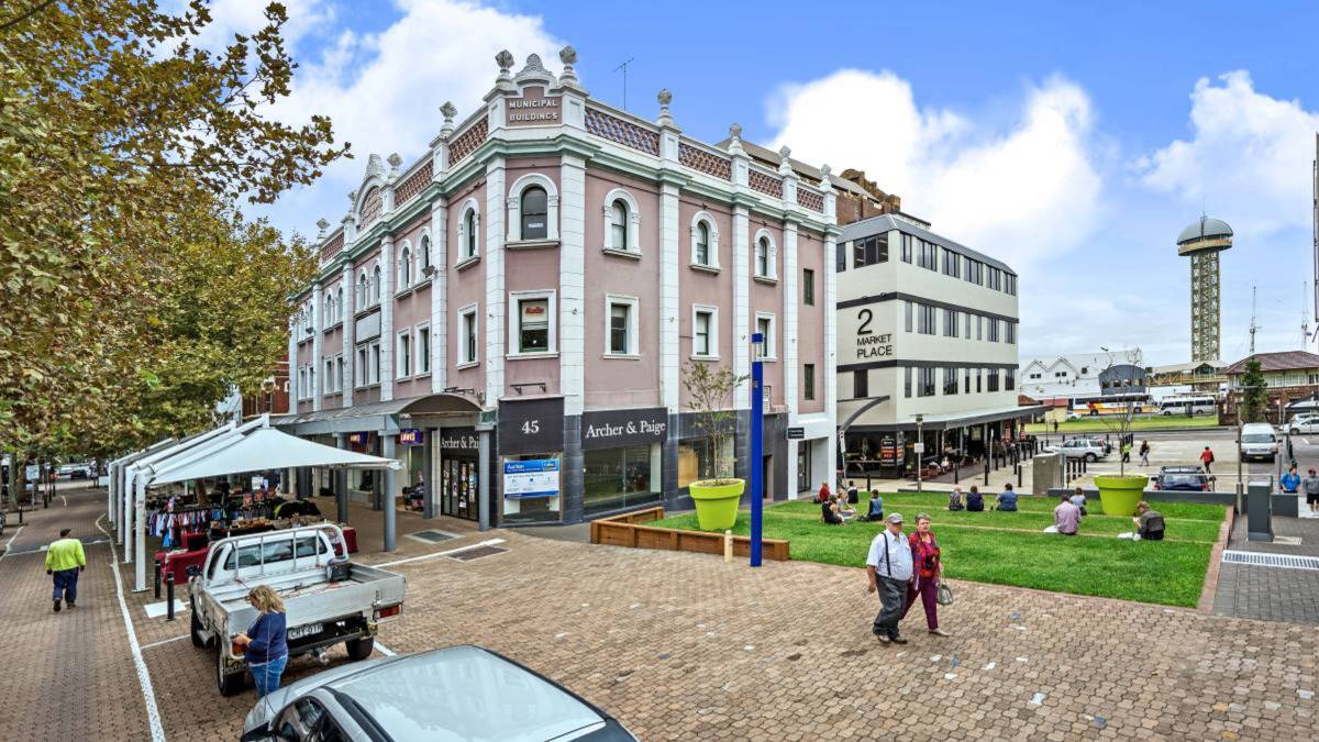 HEART OF THE CITY: The historic Municipal building is opposite Queens Wharf and sold for $3.275 million at auction in May. 