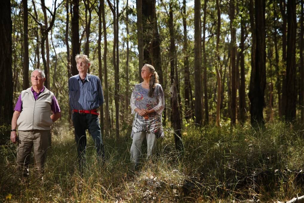 ALARMED: Conservationists Brian Purdue, David Horkan and Sharon Healey were stunned to learn that a developer has revived plans for a controversial rezoning at Fletcher, a year after it was knocked back. Picture: Marina Neil