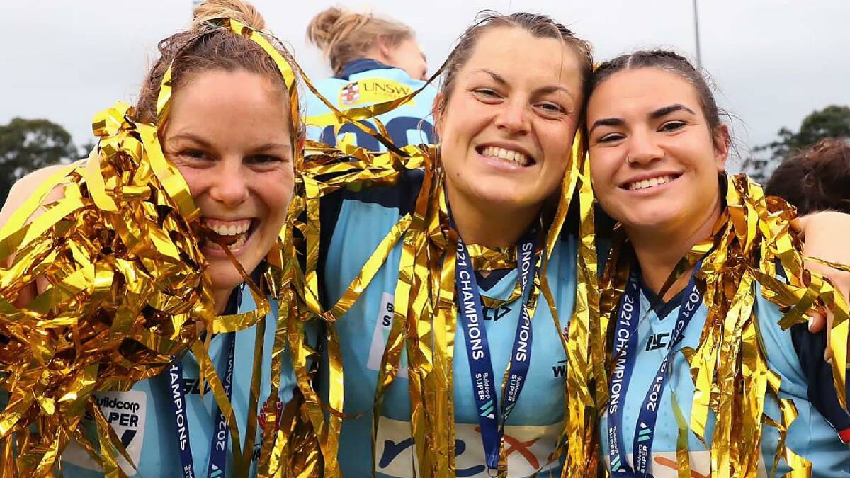 UNDEFEATED: Emily Chancellor, Grace Hamilton and Margot Vella celebrate Saturday's grand final over Queensland. Photo: NSW RUGBY/KAREN WATSON