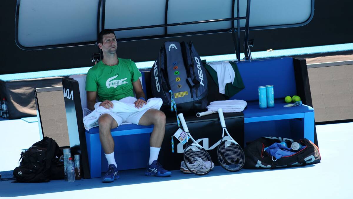 Novak Djokovic takes a break at Melbourne Park during a practice session last week. Picture: Getty Images