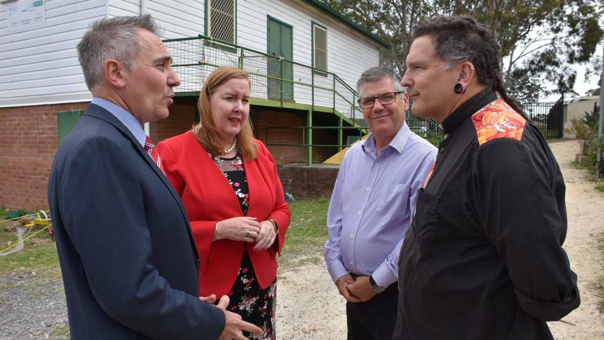 CRIME PROBLEM: Shadow Minister for Justice and Police Guy Zangari and Maitland MP Jenny Aitchison discuss crime problems with pastor Damien Parks and Reverend Doug Morrison-Cleary during Mr Zangari's visit earlier this month. 