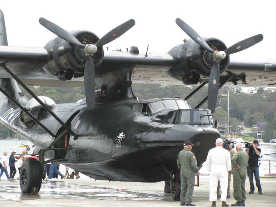 Nine lives: Felix the Black Cat, the only Catalina flying in Australia, at Rathmines in 2012. Pictures: Mike Scanlon