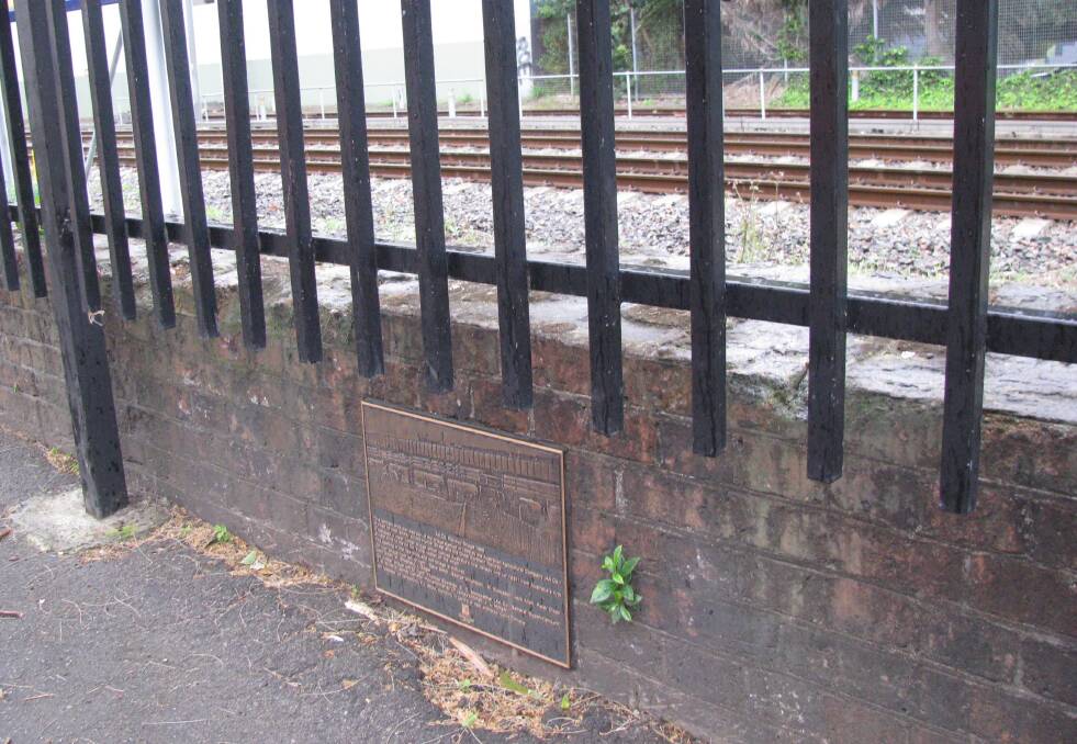 Turn back time: A wall plaque opposite Crown Street highlights a rare surviving brick pier from Hunter Street’s 1865 iron bridge, which carried coal trains.