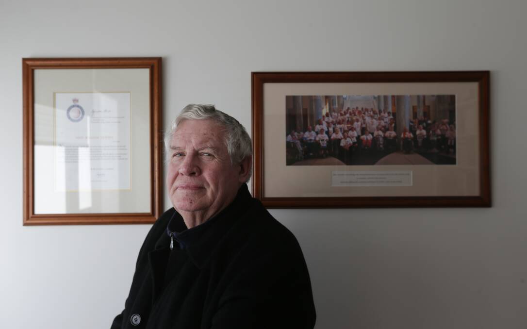 PAST EPIDEMIC: John Tierney pictured last year when he received a Queens Birthday Honour for his role as patron and past president of Polio Australia. Picture: Simone De Peak