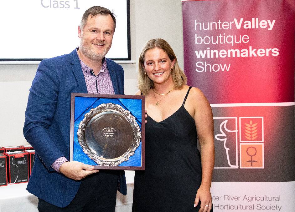 Aaron Mercer and Savannah Peterson with the 2022 Hunter Valley Boutique Wine Show trophy for best red of show. Picture by Kathleen Mackay photography.