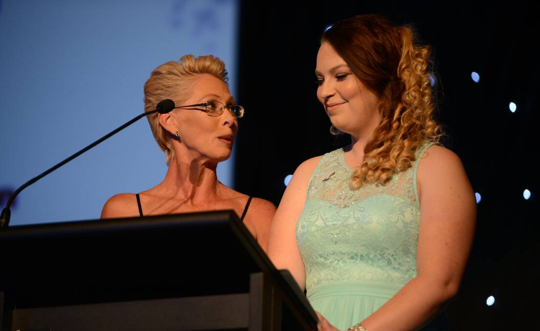GIVING BACK: Former Samaritans Student Accommodation participant Tegan Butts, 17,  and her mentor, Shelly O’Brien, speak at last year's Bean Counters Ball.
