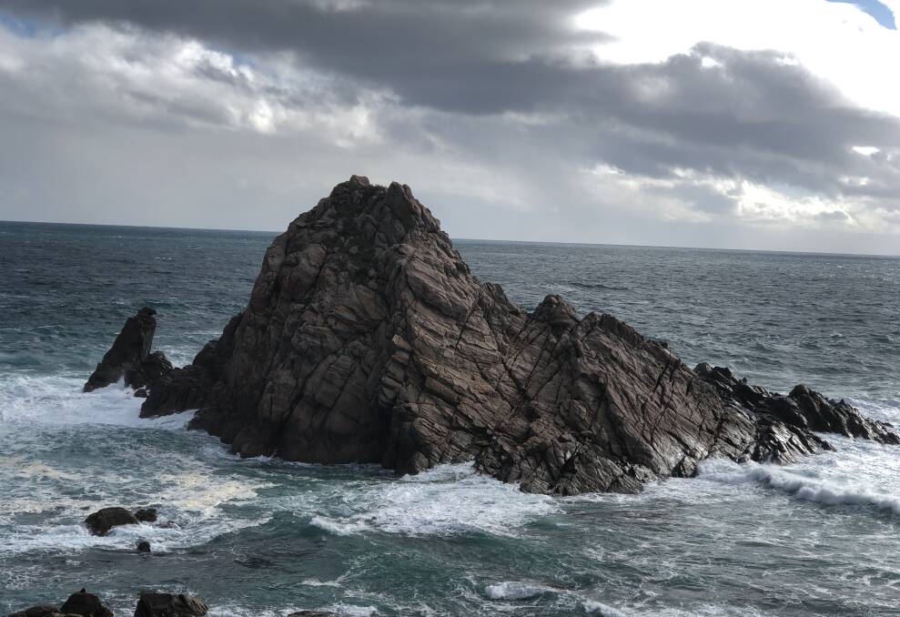 Seeing double: The 'other' Sugarloaf Rock near a remote lighthouse in Western Australia. It's a windy refuge for birds and a favourite spot for seals. 