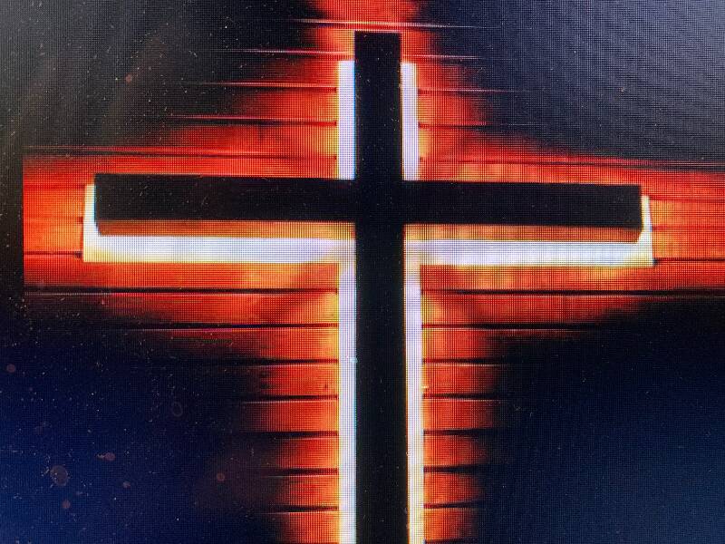 BLESSED CARRY ON: A glowing cross added a touch of mission showbiz.