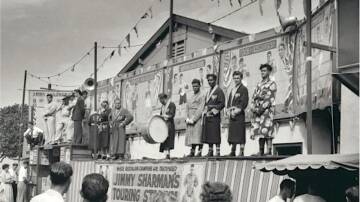 Who'll take a glove? Boxers of Jimmy Sharman's touring troupe prepare to take on all comers. Picture: Supplied 