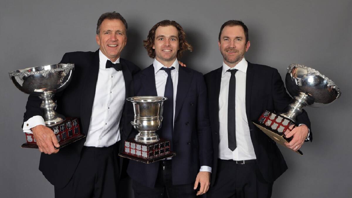THAT WINNING EXPERIENCE: Viticulturist of the Year Brett Keeping, Rising Star of the Year Angus Vinden and Winemaker of the Year Adrian Sparks with their trophies. Picture: Chris Elfes 