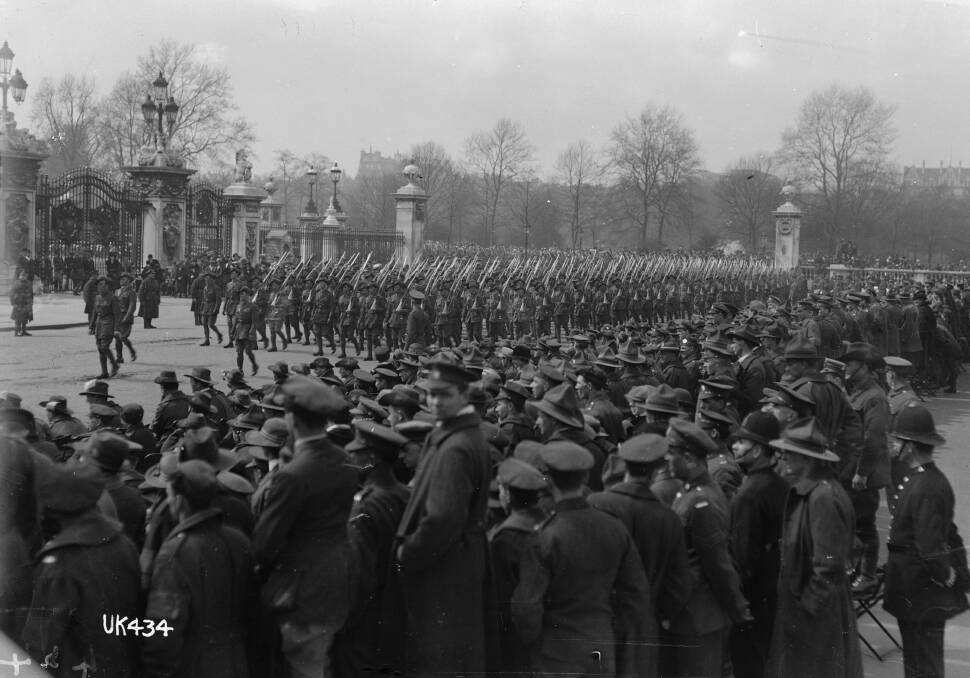 FORMIDABLE FORCE: Australian troops pass Buckingham Palace as part of the Victory parade, London, July 1919. Photo: Courtesy of Juan Mahony