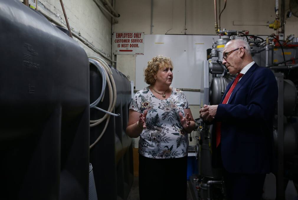 SUPER SAVER: Owner of Islington's Pride Dry Cleaning Jennie Lyons talks with small business minister Damien Tudehope. The business has halved its daily water use.