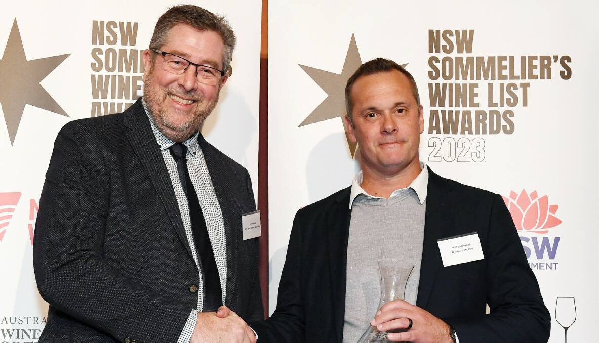 Matt Underwood (right) receives the 2023 NSW Wine Industry Association award from president Mark Bourne.