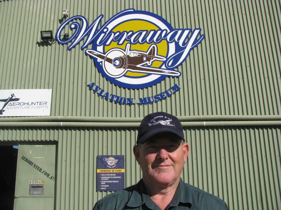 Magnificent men: Curator John Benson outside the new Wirraway Aviation Museum in Pokolbin. Pictures: Mike Scanlon