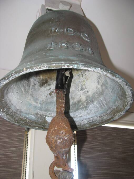THE REAL DEAL?: A close-up of the mystery bell, date stamped 1827.
