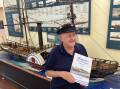 Author Wayne Patfield inside Morpeth Museum with an impressive scale model of the pioneer paddle steamer Sophia Jane. Picture: Mike Scanlon

