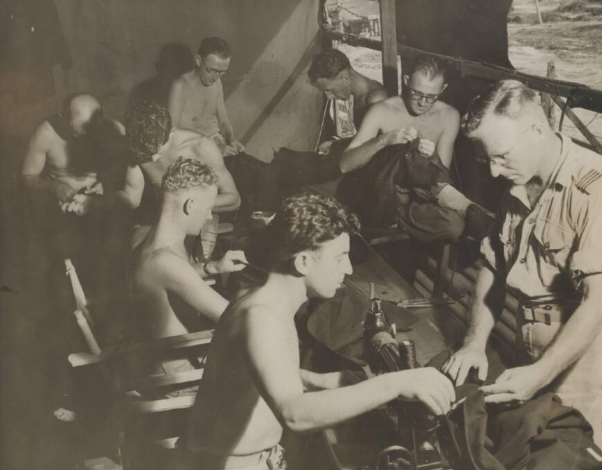 UNIFORM TASK: RAAF tailors on Labuan Island making uniforms for the RAAF's occupation force in Japan. Image: University of Newcastle's Cultural Collections 